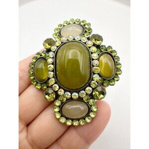 Silver tone green rhinestone floral pendant brooch